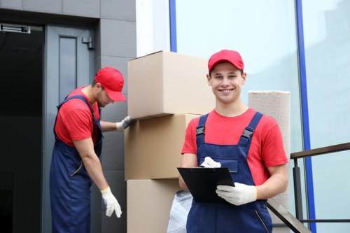 Professional removals team preparing household items for a Stockwell move