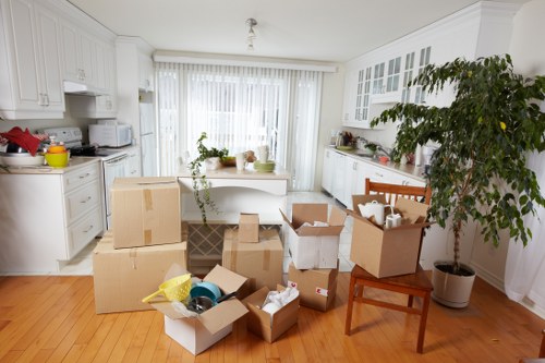 Careful handling of boxed belongings during a Stockwell moving service